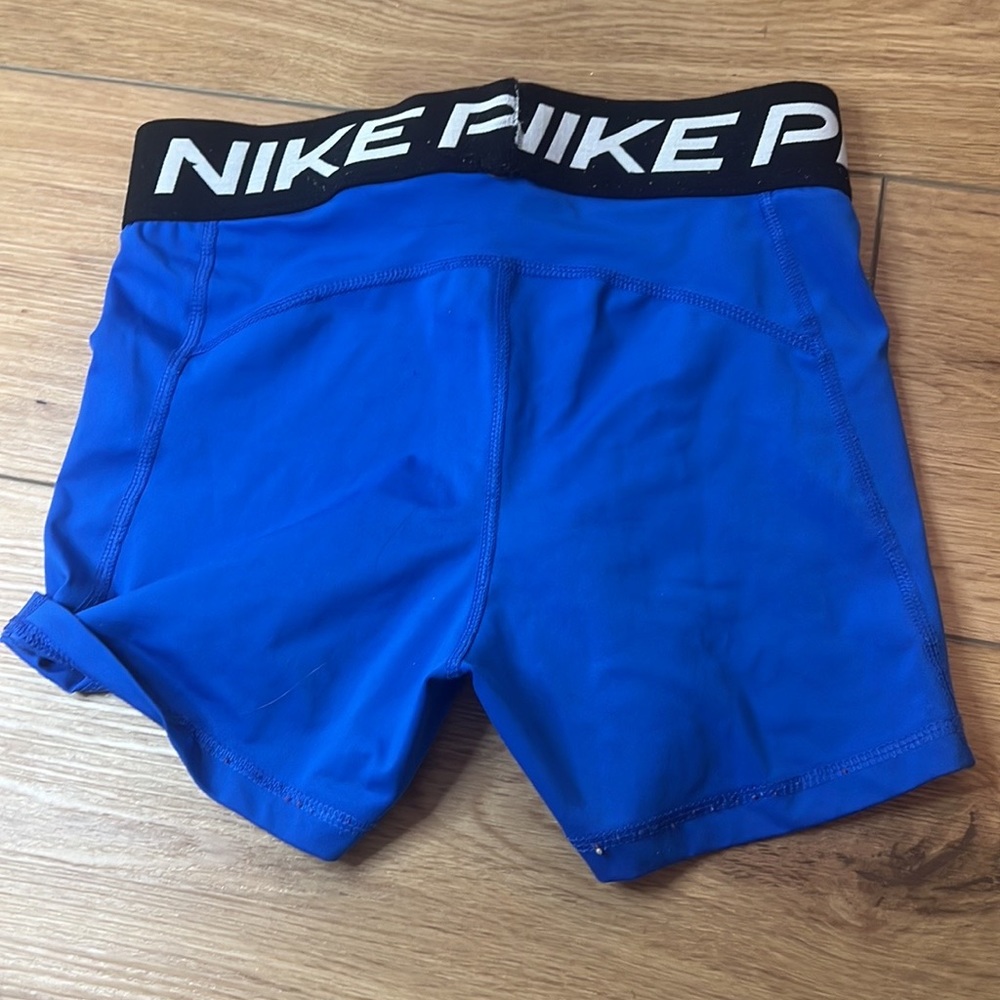 royal blue nike pros size s